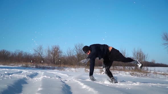 Guy Runs in Snow and Does Cool Trick Somersaults in Snowdrift