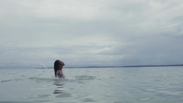 Young lady swimming in water