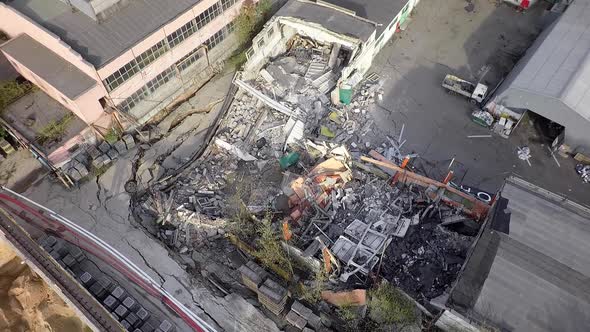 Aerial shot of destructed warehouse on plant territory