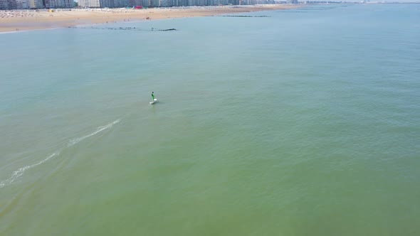 Aerial view of people doing water sport in Knokke, Belgium.