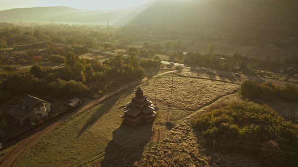 Aerial Ukrainian Historical Wooden Church in Old Village