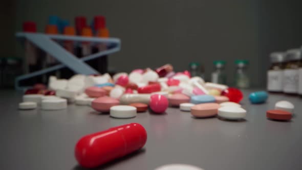 Zoom in Video of Medication Pills and Vials on Table Close Up