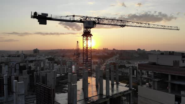 Construction Site with Building and Crane.