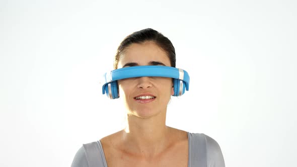 Woman pretending to use visual reality headset