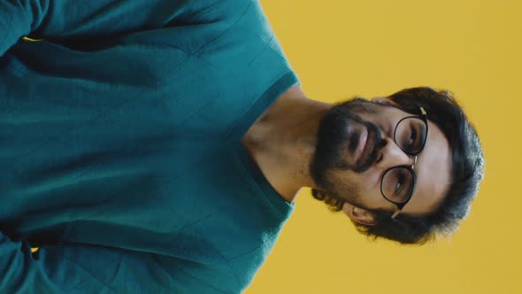 Young Man Looking Up in Disbelief