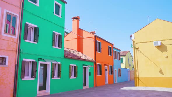 Quiet Street of Burano with Rows of Multicolored Houses