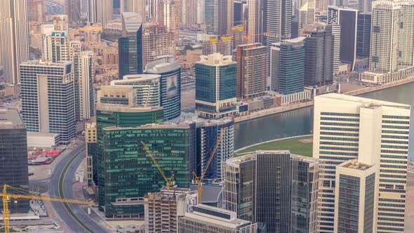 Panoramic Aerial View of Business Bay Towers in Dubai at Evening Timelapse