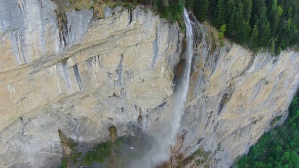 Flight over Staubbach waterfall (Staubbachfall) in Lauterbrunnen, Switzerland