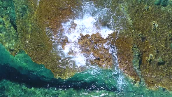 Small Islet Island Formed by the Accumulation of Rock Deposits Atop a Reef in the Sea