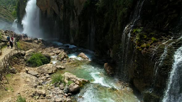 Natural Waterfalls with Tourists