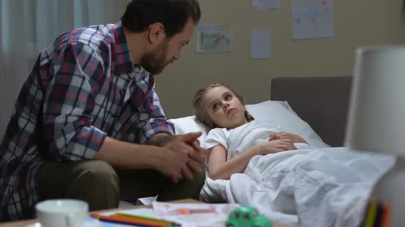 Father Touching Daughter Forehead Measuring Temperature, Taking Care, Health