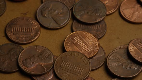 Rotating stock footage shot of American pennies (coin - $0.01) - MONEY 0170