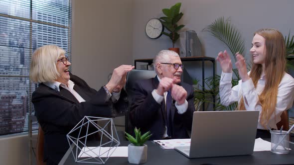 Company Collegues Joining Hands Give High Five in Air Celebrating Corporate Unity Success at Office