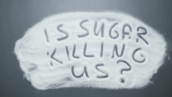 Hand erased text Is sugar killing us? Obesity concept. Stop diabetes.