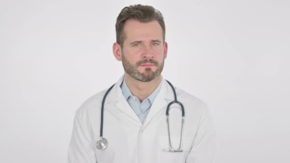 Portrait of Middle Aged Doctor Showing No Sign By Head Shake
