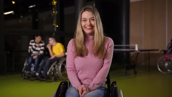 Portrait of Disabled Young Woman in Wheelchair