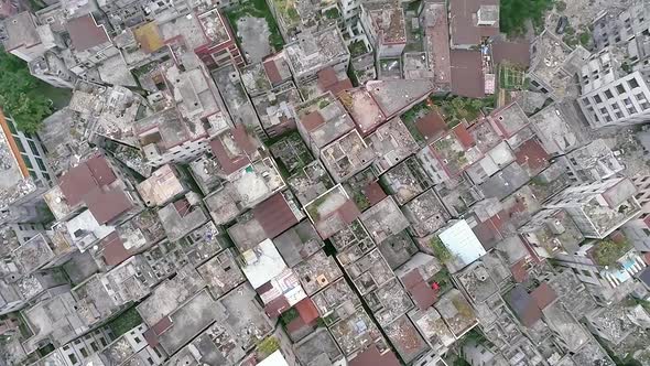 A Surreal Landscape of Empty Courtyards and Decaying Buildings.