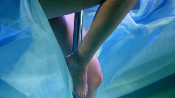 Acrobatic Dance Show Underwater Closeup View of Female Legs on Pylon Beauty and Art