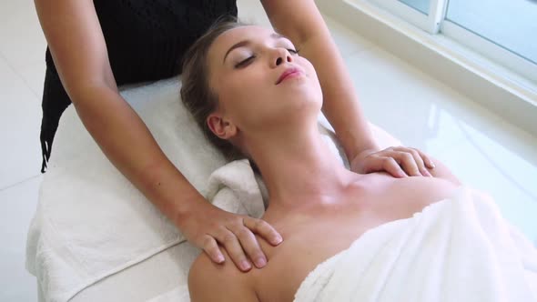 Woman Gets Shoulder Massage Spa By Therapist