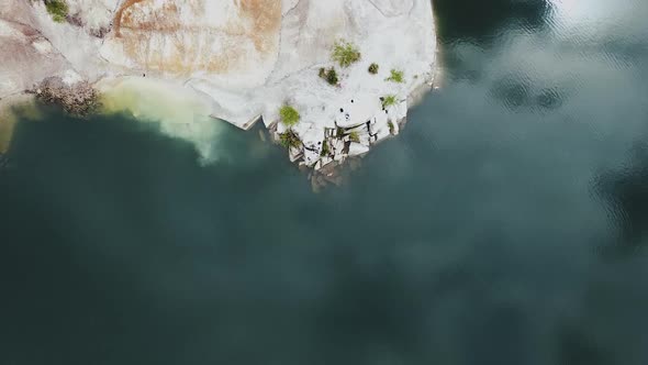 Aerial View on the Blue Lake and Island with Rocky Shore