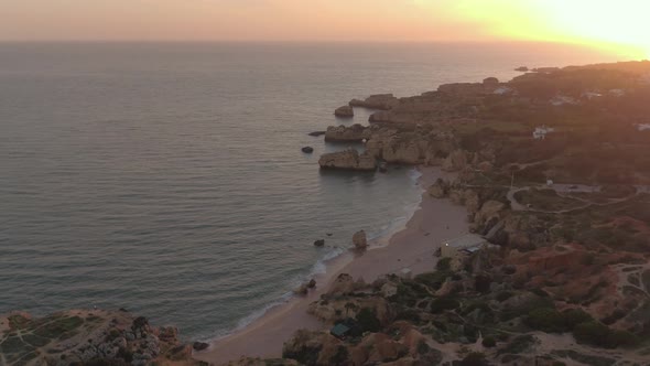 Aerial view of the coast at sunset