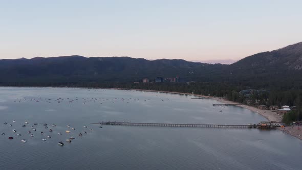 Super wide aerial shot of South Lake Tahoe, California and Stateline, Nevada during low light in the