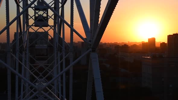 Ferris wheel point of view at sunset