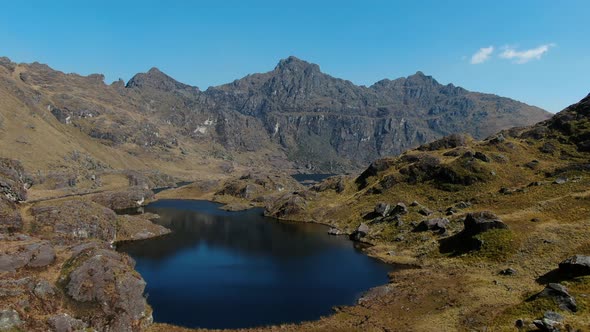 4k aerial drone footage over the 5th lagoon of Pichgacocha from Ambo, Huanuco, Peru in the Andes mou