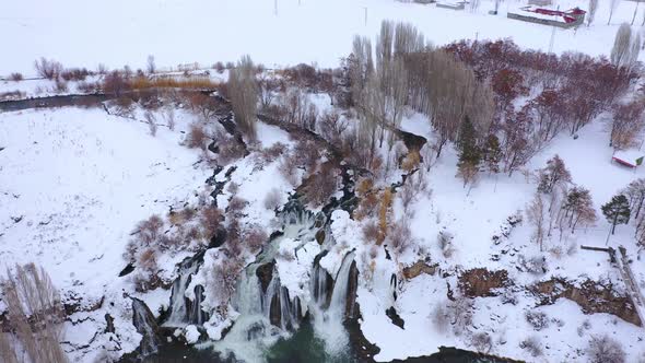 Winter drone waterfall