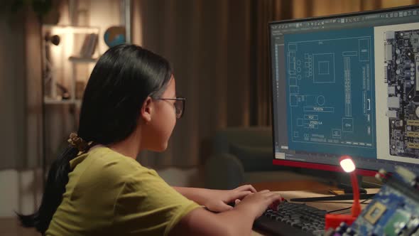 Asian Girl Is Working With Desktop Computer In Home, Display Showing Cad Software, Genius Children