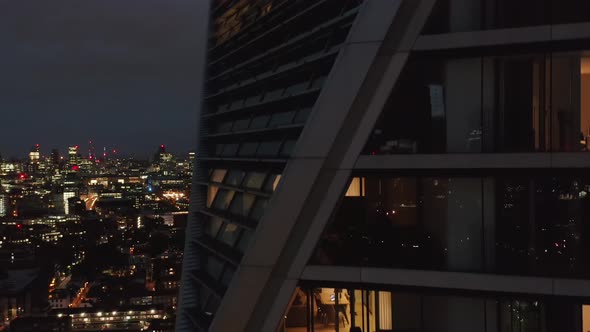 Night Ascending Footage of High Rise Luxury Apartment Building