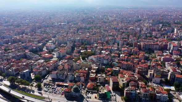 Aerial View of City Highway Interchange and City Buildings