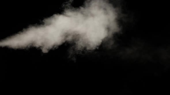 Water Vapor. White Jet of Vapour Steam Under Pressure on Black Background
