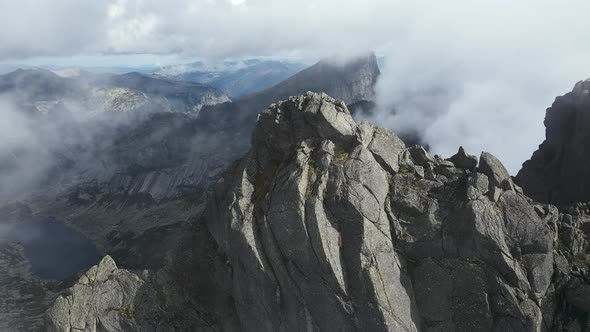 Huge Stones Boulders and Rocks Shrouded in Low Clouds Ergaki Natural Park