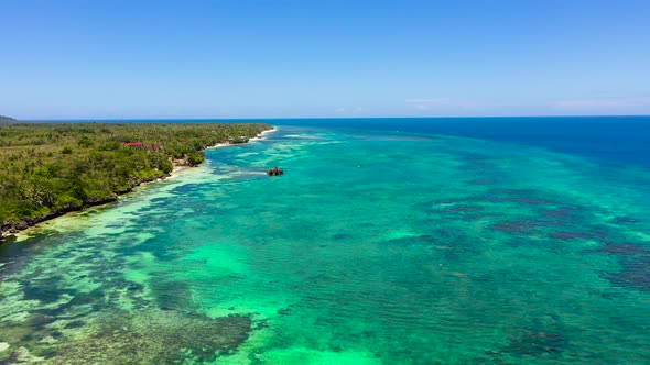 Coast with a Beach and Blue Sea