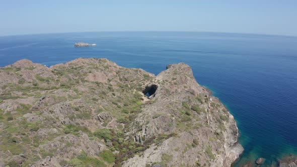 Drone Flight Over Rock Hole on Cap De Creus Cape