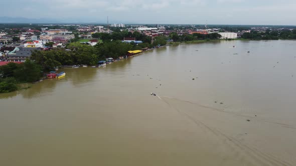 Aerial view boat arrive jetty of Teluk Intan