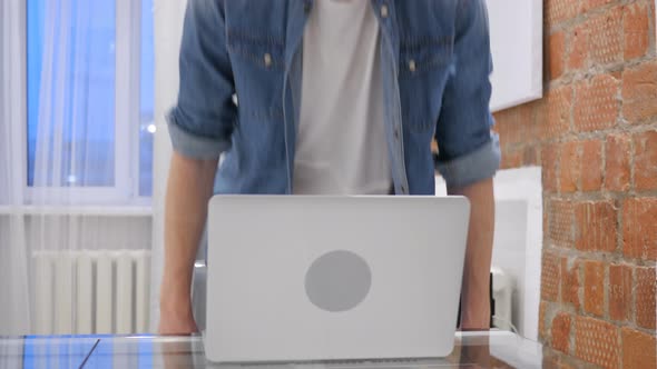 Redhead Beard Man Coming for Working on Laptop