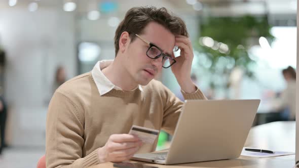 Online Shopping Failure on Laptop By Creative Young Man