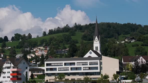 Panoramic View Liechtenstein with Houses on Green Fields in Alps Mountain Valley