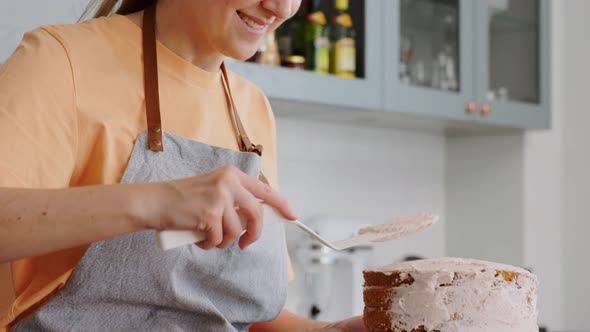 Woman Cooking Food and Baking on Kitchen at Home