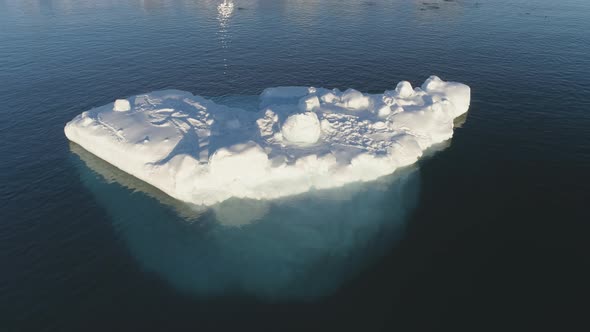 Close-up Iceberg Floating In Antarctic Ocean