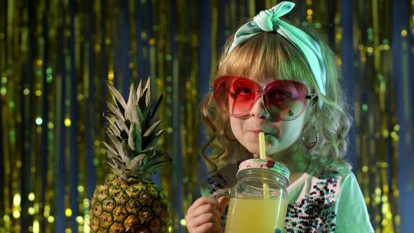 Trendy Stylish Child Kid with Pineapple Fruit Drinking Juice in Futuristic Club with Neon Light