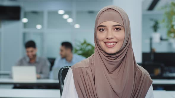 Portrait of Pleasant Smiling Arabian Businesswoman in Hijab Confident Female Insurance Broker Bank