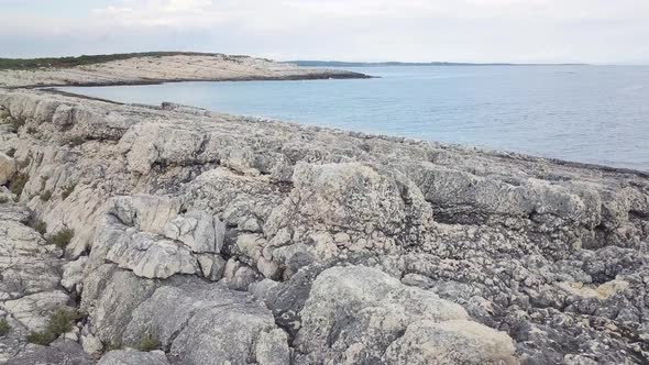 Desert Rocky Mediterranean Coast And Speed Boat On Background 