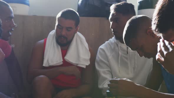 Group of soccer players in the locker room