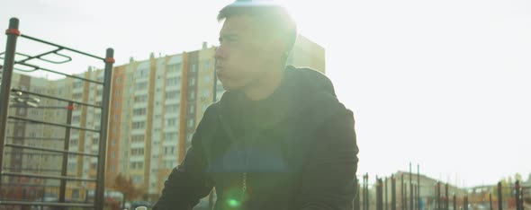 Man Drinking Water after Outdoor Workout