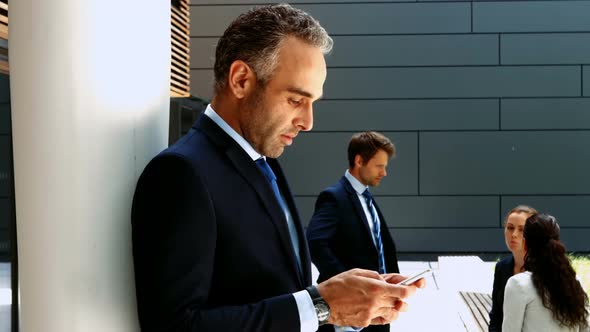 Businessman talking on mobile phone