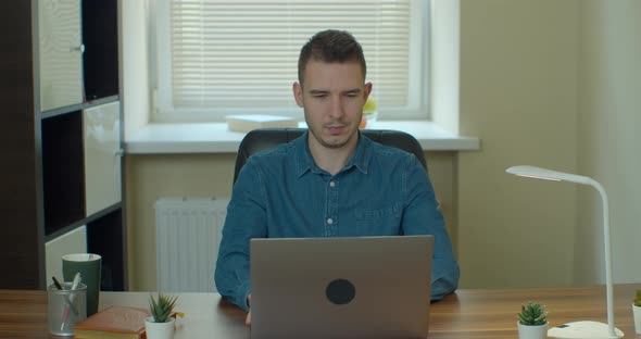 Web Developer Working at the Computer