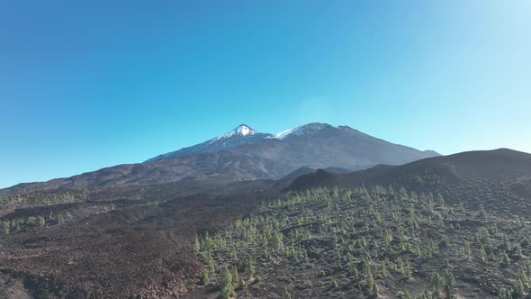 Drone Aerial of the Peak of a Volcanic Mountain in a National Nature Park Rocky Rough Beautiful